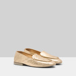 Pair view of platinum mandolo mocassino on white background, with no model shown