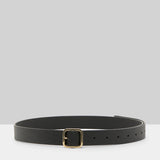 Open view of black marsell quadra belt on white background with no model shown.