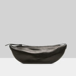 Front view of black marsell volta shoulder bag on white background, with no model shown.