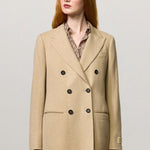 Front view of naturale beatric db jacket on model wearing naturale skirt, against a white background.