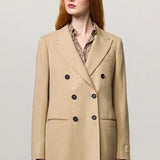 Front view of naturale beatric db jacket on model wearing naturale skirt, against a white background.