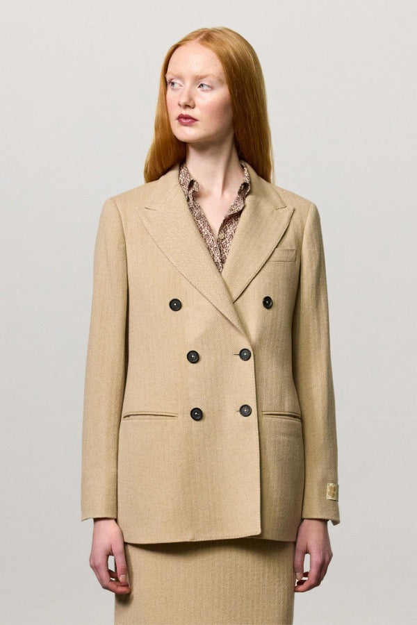Front view of naturale beatric db jacket on model wearing naturale skirt, against a white background.