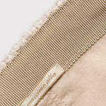 Inside view of pearl chance hat on white background, with no model shown.