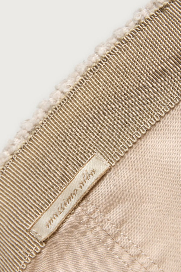 Inside view of pearl chance hat on white background, with no model shown.