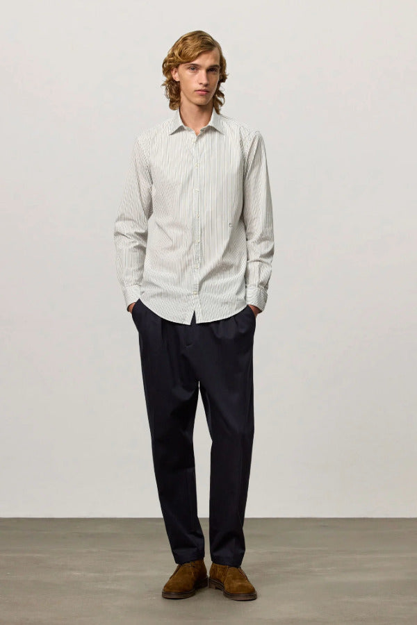 Front view of pine genova classic shirt on model wearing black trousers and brown suede shoes, against a white background.
