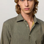 Front closeup view of verde genova classic shirt on model, against a white background.