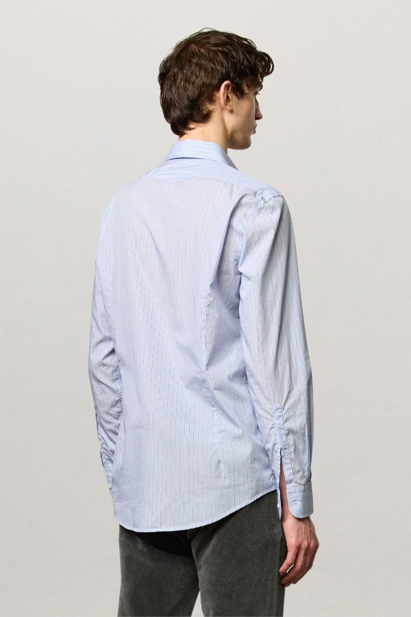 Back view of azzurro genova classic shirt on model wearing grey shirt, against a white background.