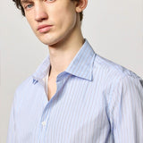Front closeup view of azzurro genova classic shirt on model, against a white background.