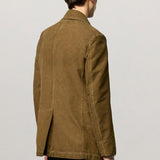 Back view of rusk lucio peacoat on model wearing blue pants, against a white background.