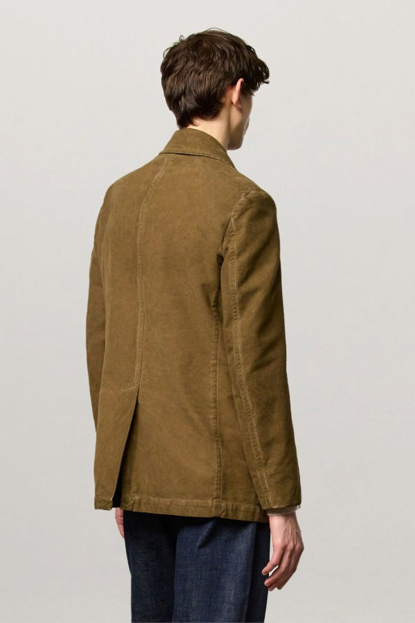 Back view of rusk lucio peacoat on model wearing blue pants, against a white background.