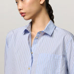 Front closeup view of azzurro uma classic shirt on model, against a white background.