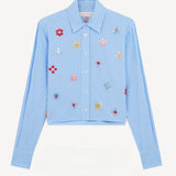 Front view of blue/white button embroidered Cropped Shirt on white background, with no model shown.