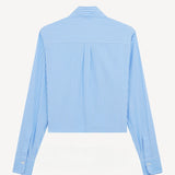 Back view of blue/white button embroidered cropped shirt on white background, with no model shown.