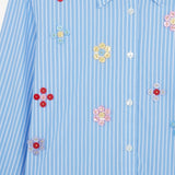 Front closeup of blue and white button embroidered ls shirt dress on white background, with no model shown.