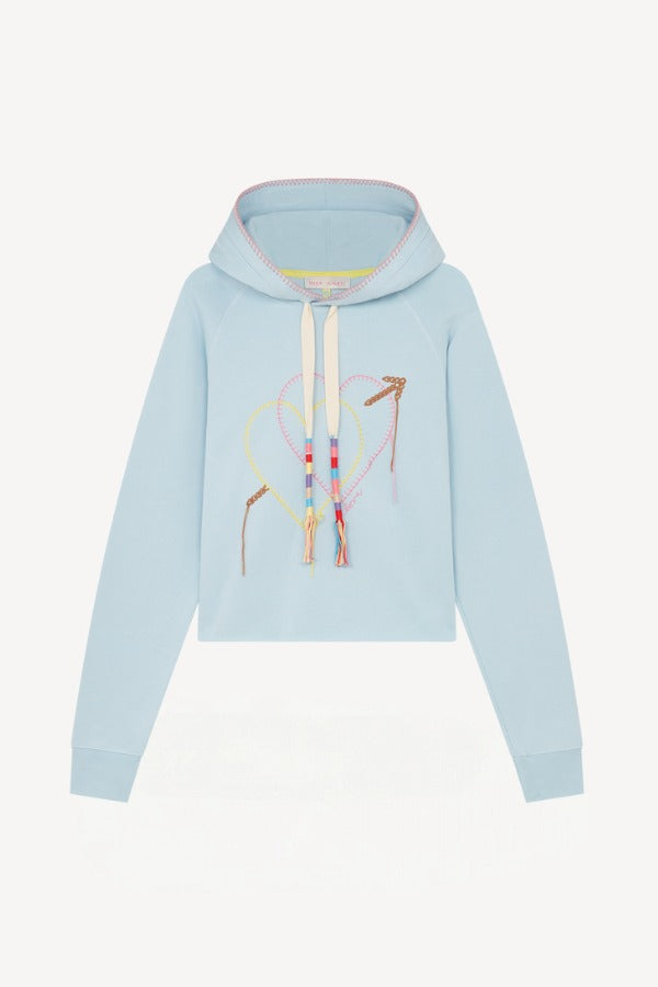 Front view of pale blue embroidered heart hoodie on white background, with no model shown.