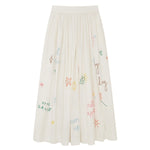 Front view of white embroidered scribble skirt on white background, with no model shown.