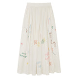 Front view of white embroidered scribble skirt on white background, with no model shown.