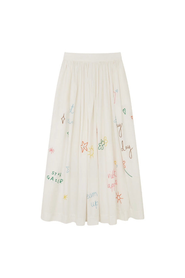 Front view of white embroidered scribble skirt on white background, with no model shown.
