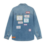 Back view of mid blue embroidered word patch denim overshirt on white background, with no model shown.