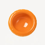 Overhead view of orange hand sprayed ombre bowl on white background, with no model shown.