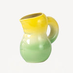 Front view of yellow hand sprayed ombre jug on white background, with no model shown.