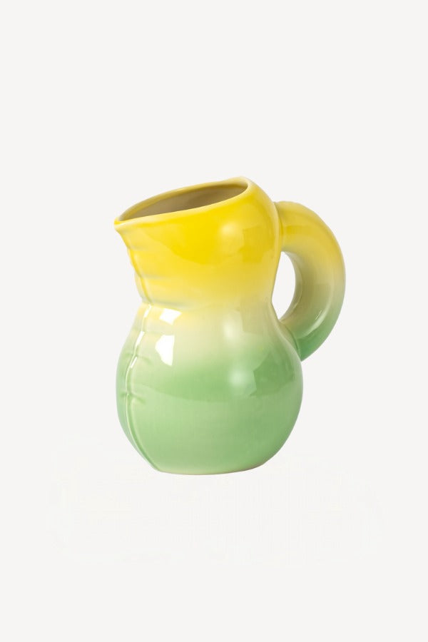 Front view of yellow hand sprayed ombre jug on white background, with no model shown.