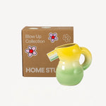 Alternate front view of yellow hand sprayed ombre jug on box white background, with no model shown.