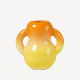 Front view of orange hand sprayed ombre vase on white background, with no model shown.