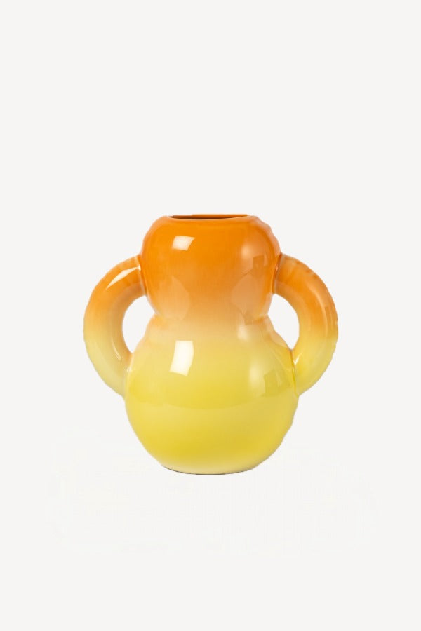 Front view of orange hand sprayed ombre vase on white background, with no model shown.