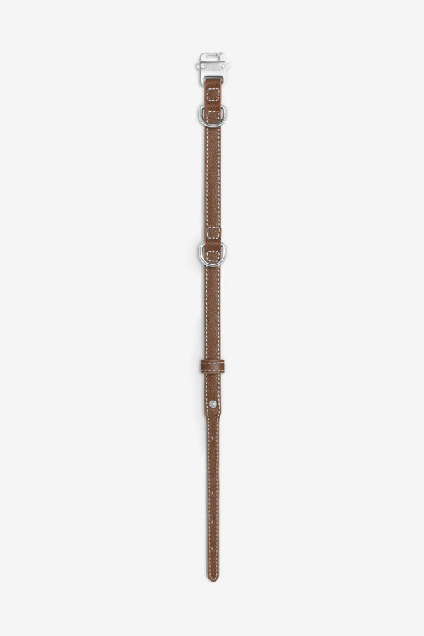Open view of walnut clyde collar on white background, with no model shown.
