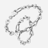 Two Linque steel collars linked on white background, with no model shown.