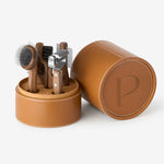 Front view of Pansage grooming kit in the box on white background, with no model shown.