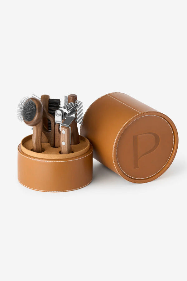 Front view of Pansage grooming kit in the box on white background, with no model shown.