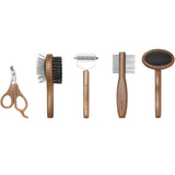 Front view of 5 kit accessory of Pansage Grooming kit on white background, with no model shown.