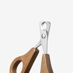 Front view of nail clippers on white background, with no model shown.