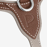 Front closeup view of walnut petite harness on white background, with no model shown.