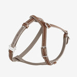 Side view of walnut petite harness on white background, with no model shown.