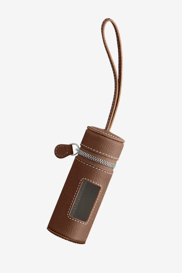 Front view of walnut the pouchette dog bag holder on white background, with no model shown.