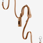Front view of saddle tascher leash on white background, with no model shown.