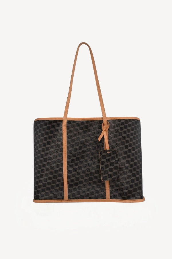 Front view of black/tan canvas cube and calf cab tote on white background, with no model shown.