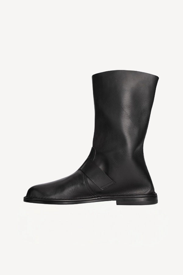Left side view of black kristen ankle boot on white background, with no model shown.