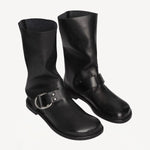 Front slanted view of black kristen ankle boot on white background, with no model shown.