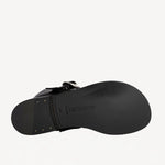 Sole view of black kristen ankle boot on white background, with no model shown.