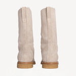 Back view of off-white montana suede and sherling ankle boot on white background, with no model shown.