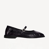 Right side view of plum patent trish ballet flat on white background with no model shown.