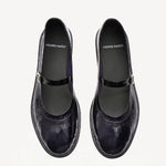 Overhead view of plum patent trish ballet flat on white background, with no model shown.