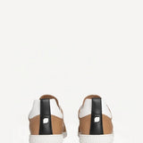 Back view of camel start sneakers on white background, with no model shown.