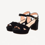 Pair view of black crushed velvet deidre platform sandals on white background, with no model shown.