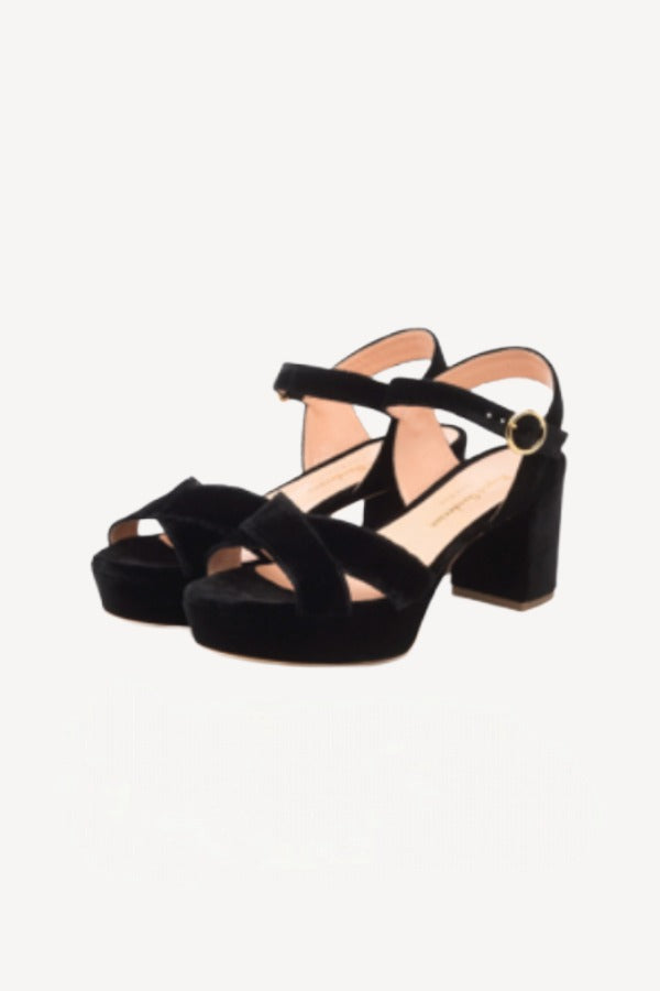 Pair view of black crushed velvet deidre platform sandals on white background, with no model shown.
