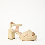Right side view of natural raffia deidre platform on white background, with no model shown.